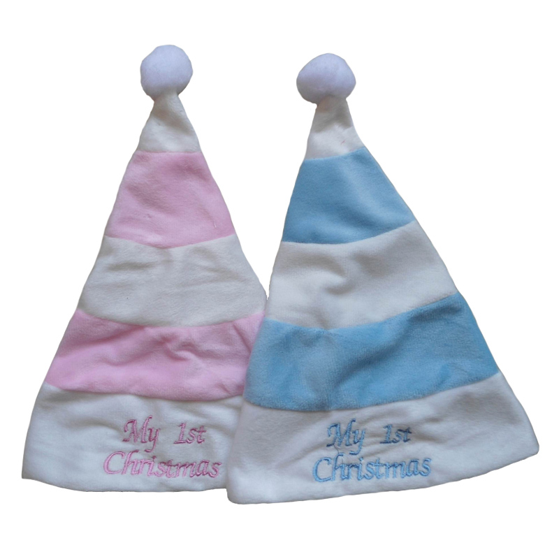 Il primo set di calze del cappello di Natale del bambino