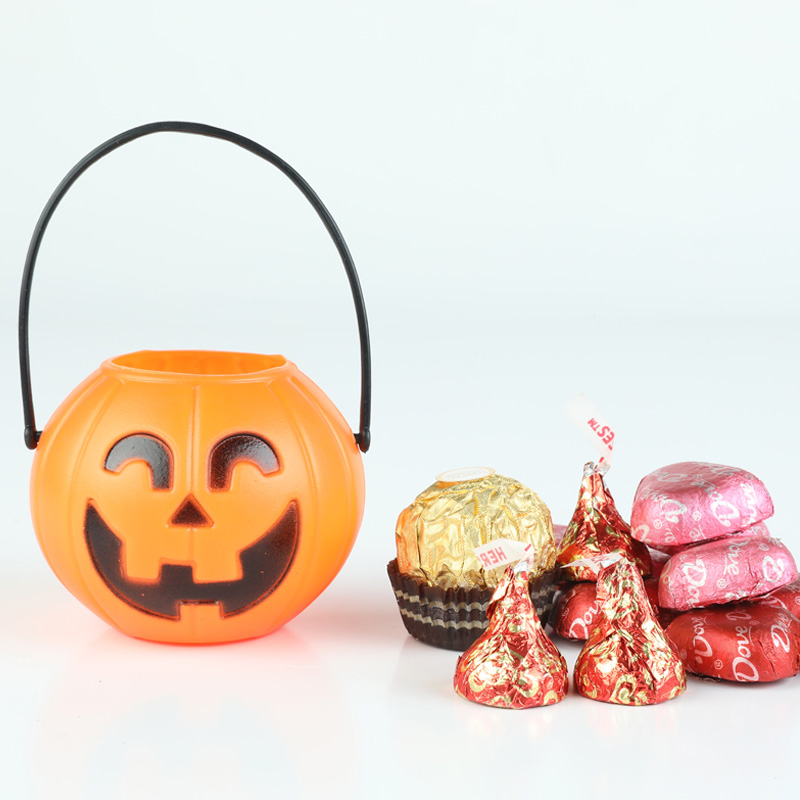 Barattolo di caramelle in plastica per bambini Secchio di zucca Jack-o-lantern