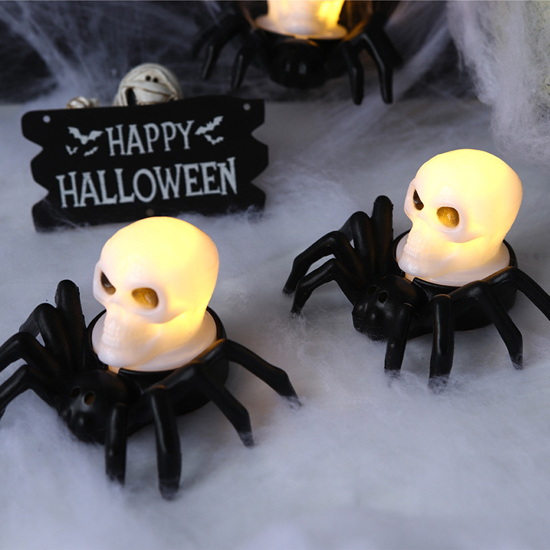 Candele elettroniche a LED a forma di ragno e a forma di occhio